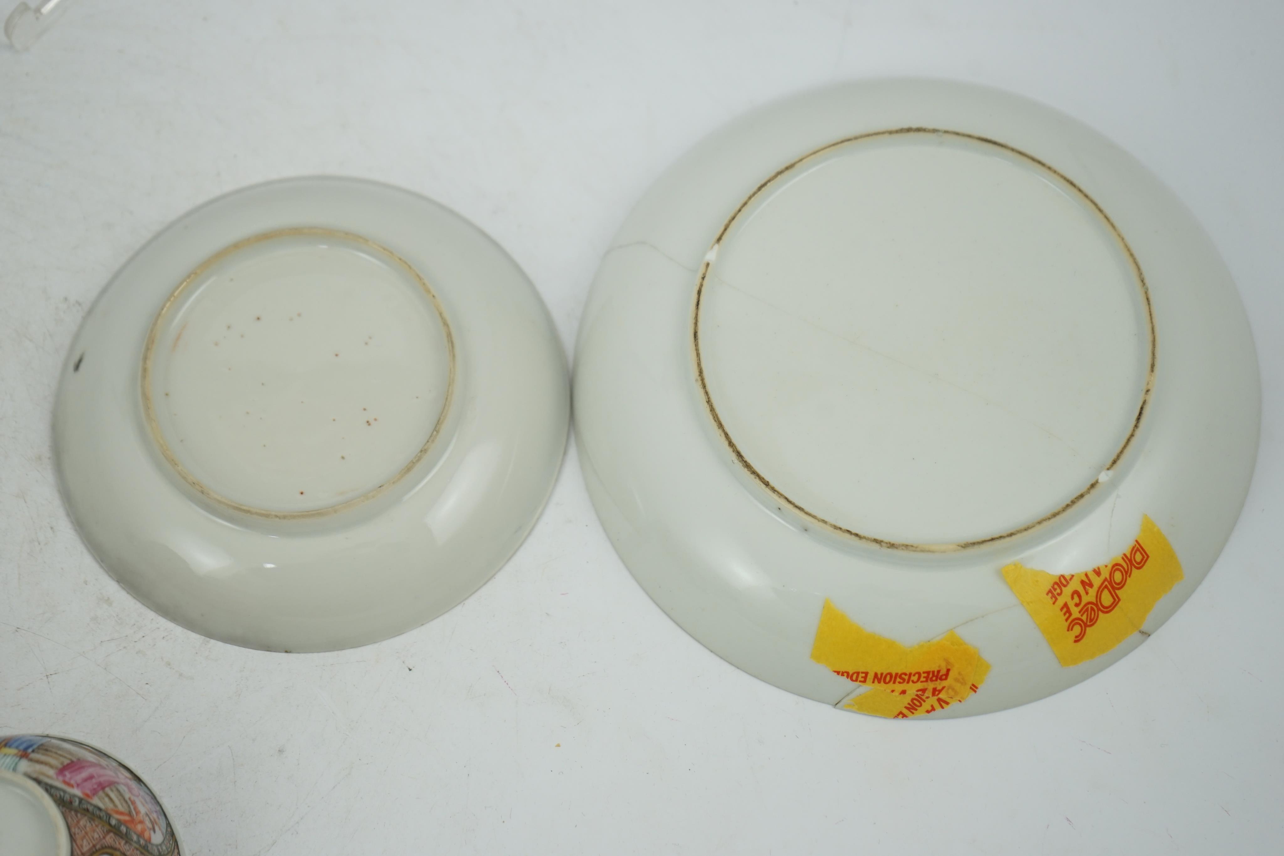 A Chinese ‘mandarin’ pattern tea bowl, coffee cup and saucer, Qianlong period